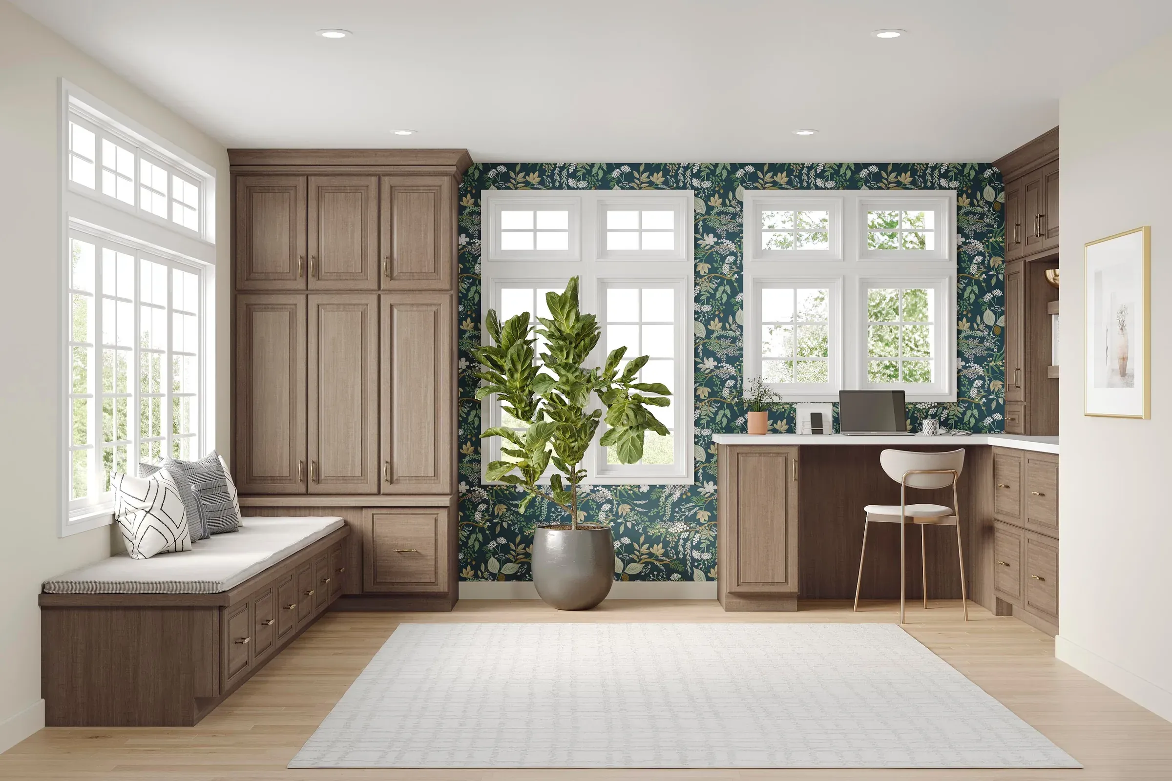 Home office in almond maple with a cushioned window seat, tall storage cabinets, and botanical wallpaper.
