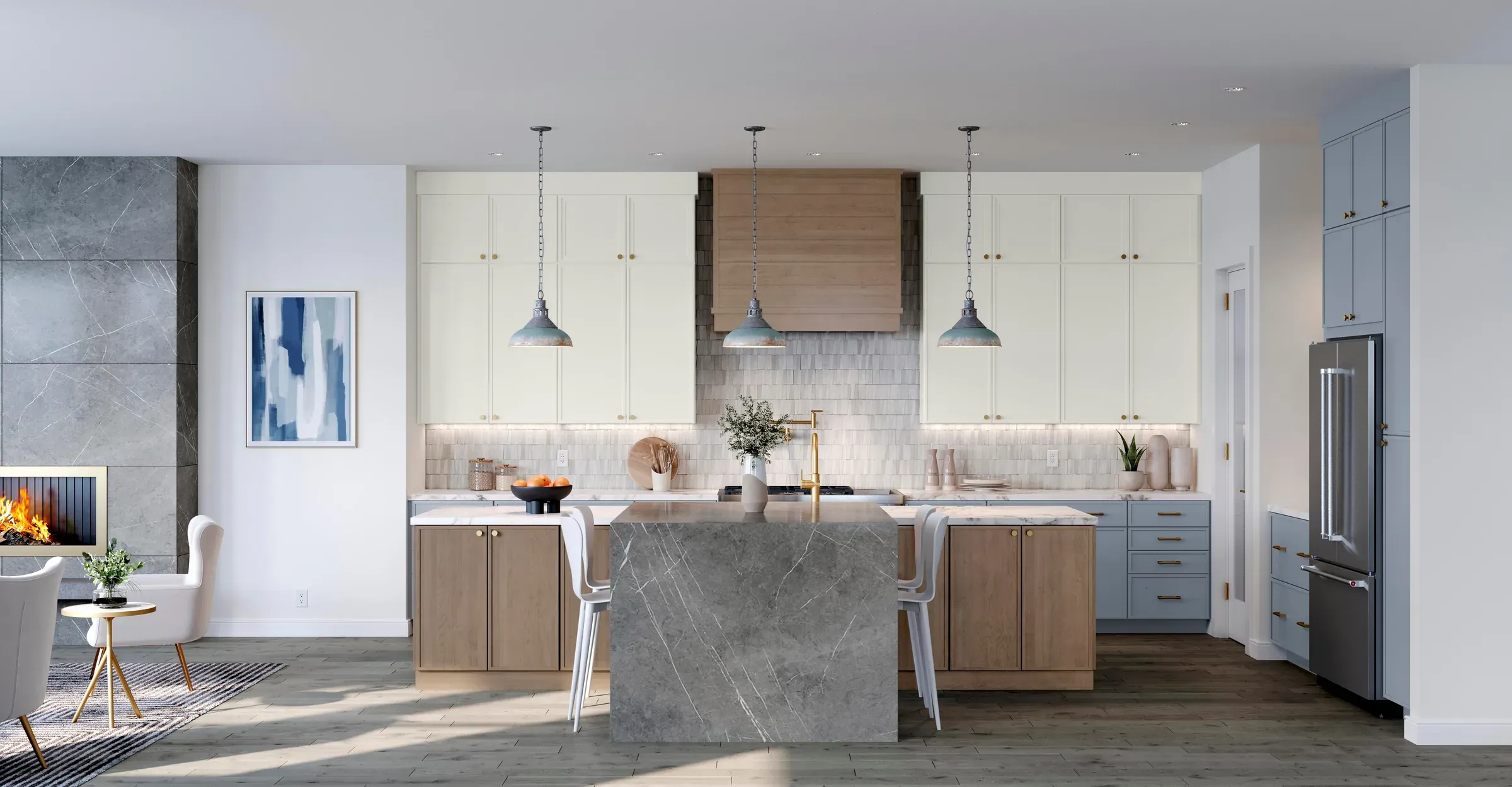 Wide view of a kitchen with mist-blue base cabinets, linen-white uppers, a wood hood, and a stone waterfall island.