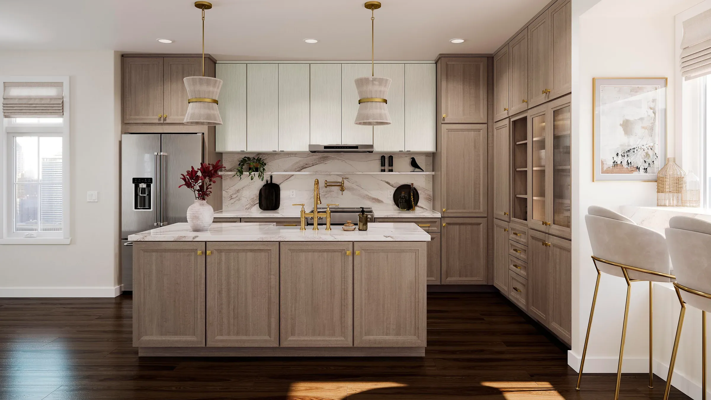 Marble-topped island in almond maple with pendant lighting and a glass-front cabinet beyond.